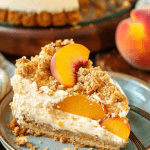 Serving Bourbon Peach Streusel Cheesecake