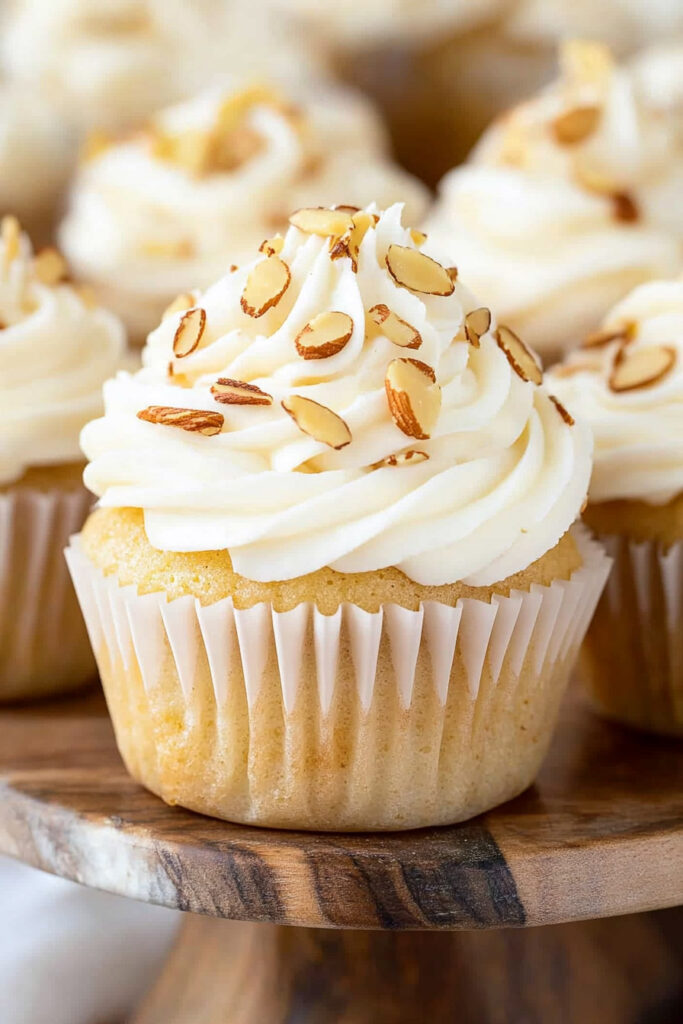 Frosting the Almond Amaretto Cupcakes