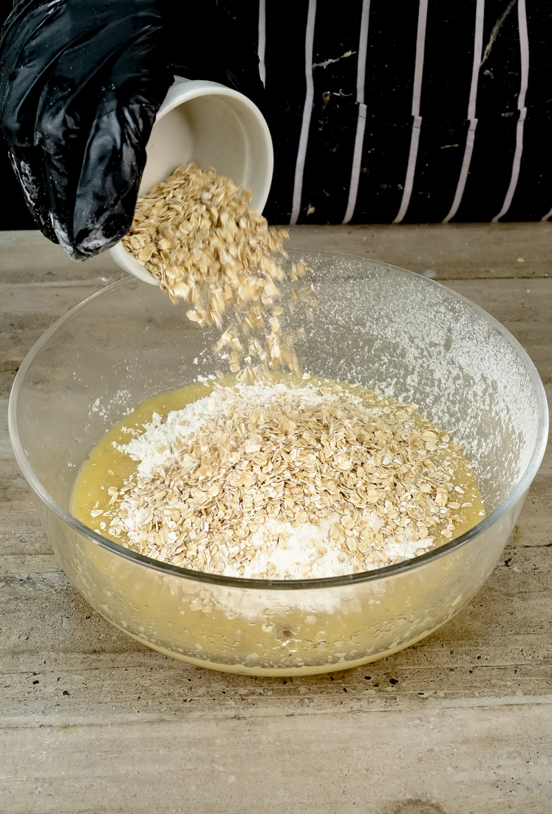 Adding rolled oats to applesauce muffin batter for texture