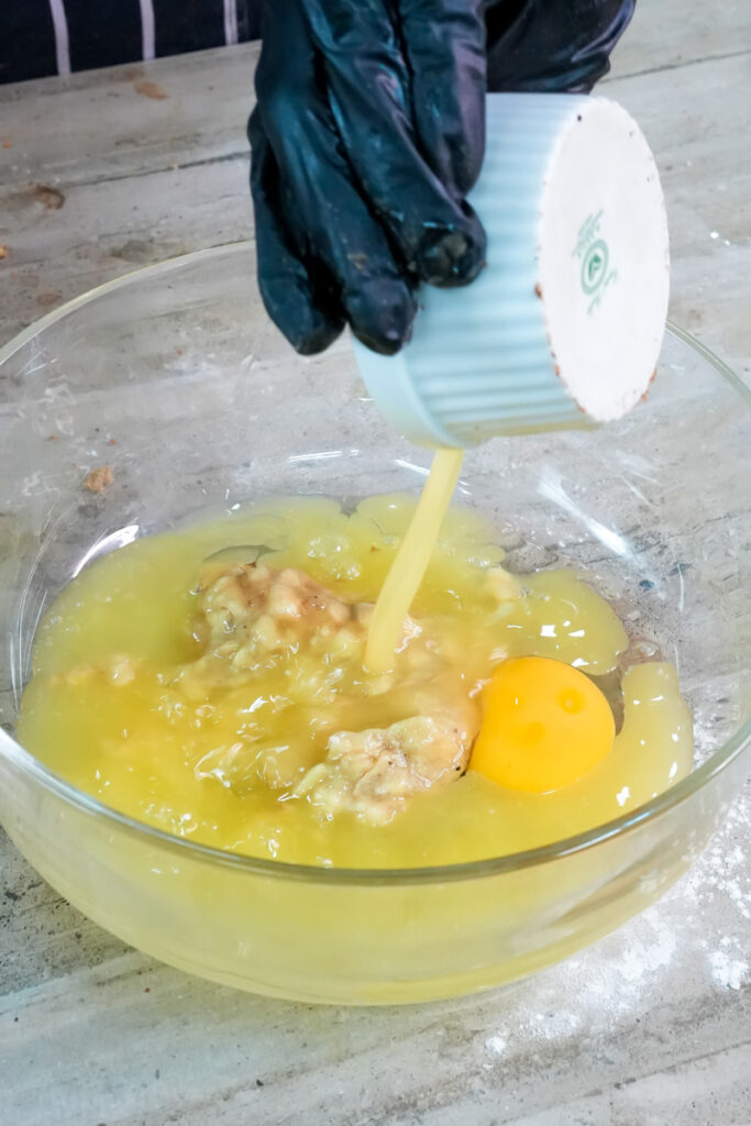 Adding vanilla extract to banana muffin batter