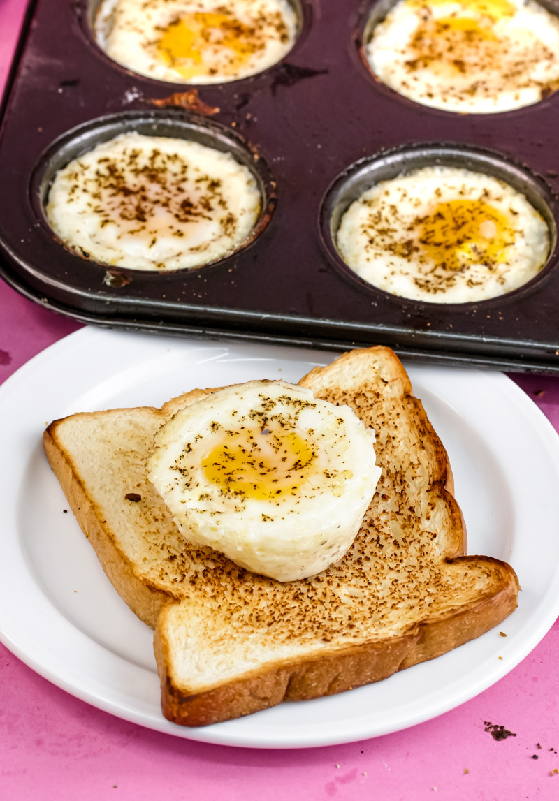 Baked egg from muffin tin served on toast