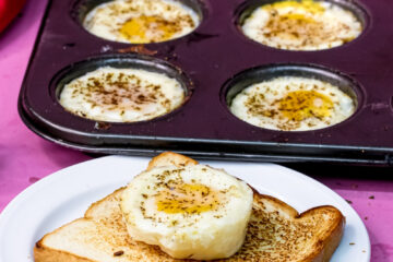 Baked eggs in muffin tin with egg on toast