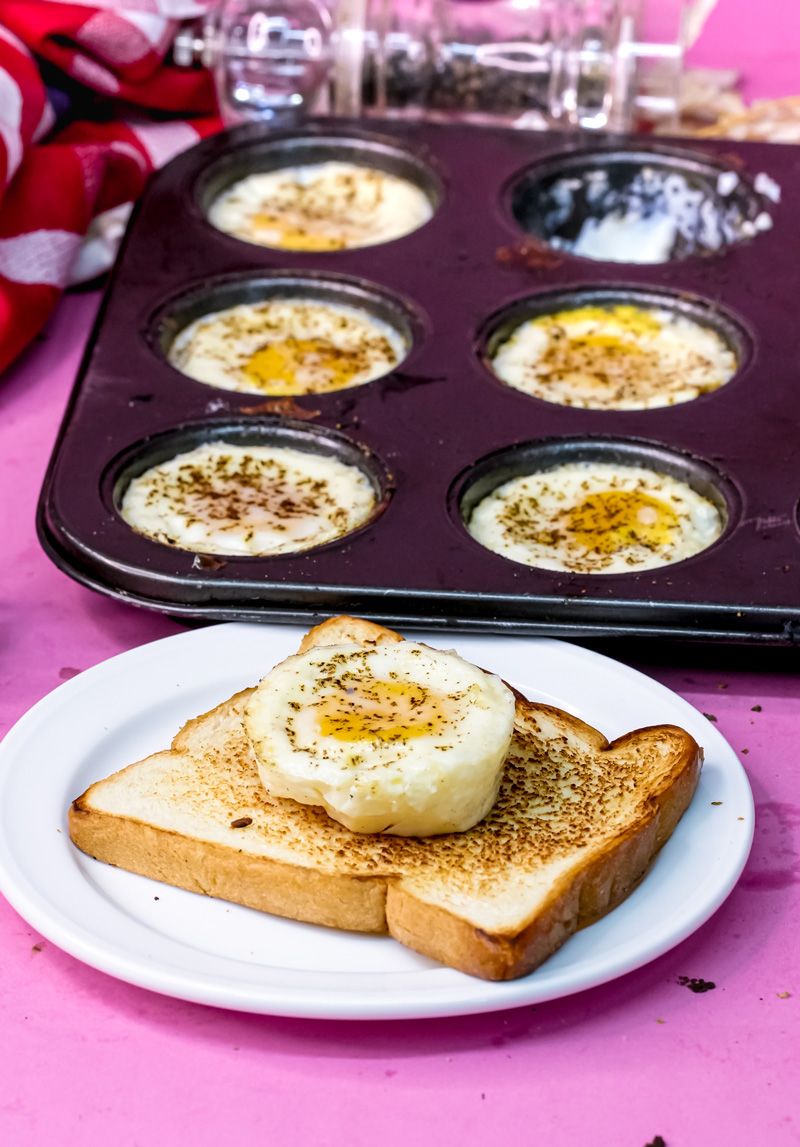 Baked eggs in muffin tin with egg on toast