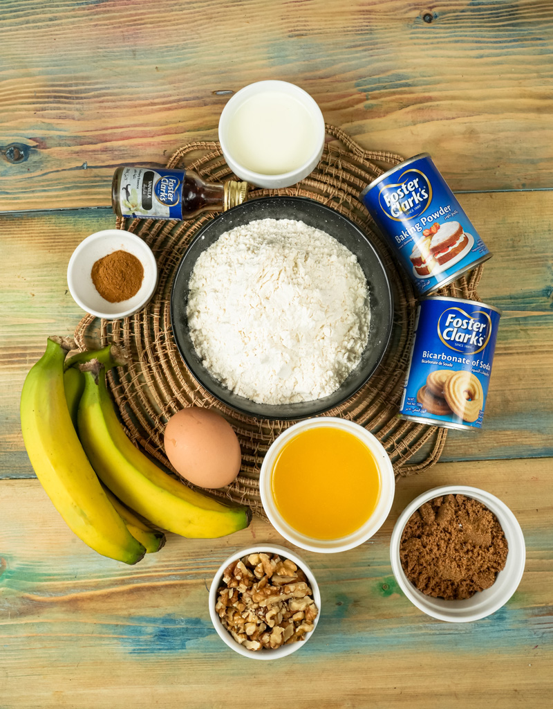 Banana muffin ingredients including flour, ripe bananas, eggs, and spices