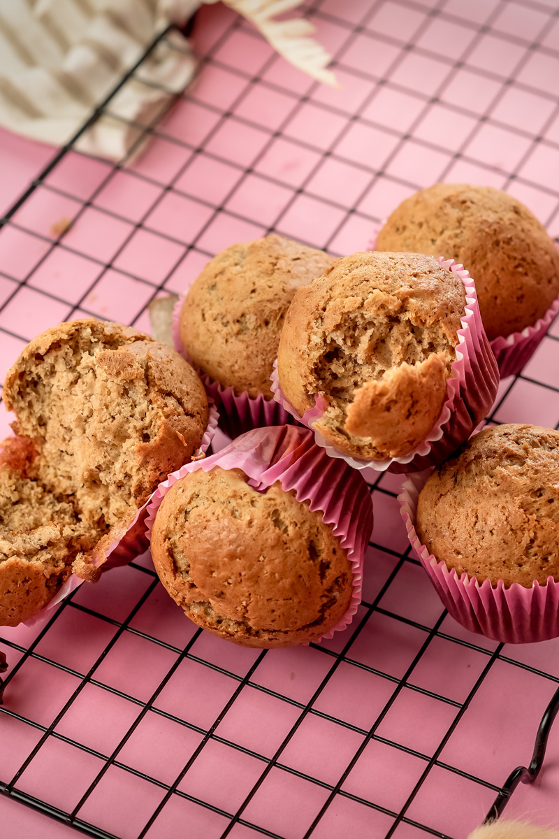 Broken banana muffin revealing soft crumb texture