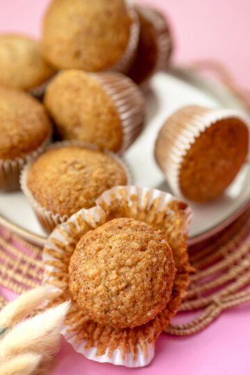 Close-up of moist applesauce muffin in paper liner