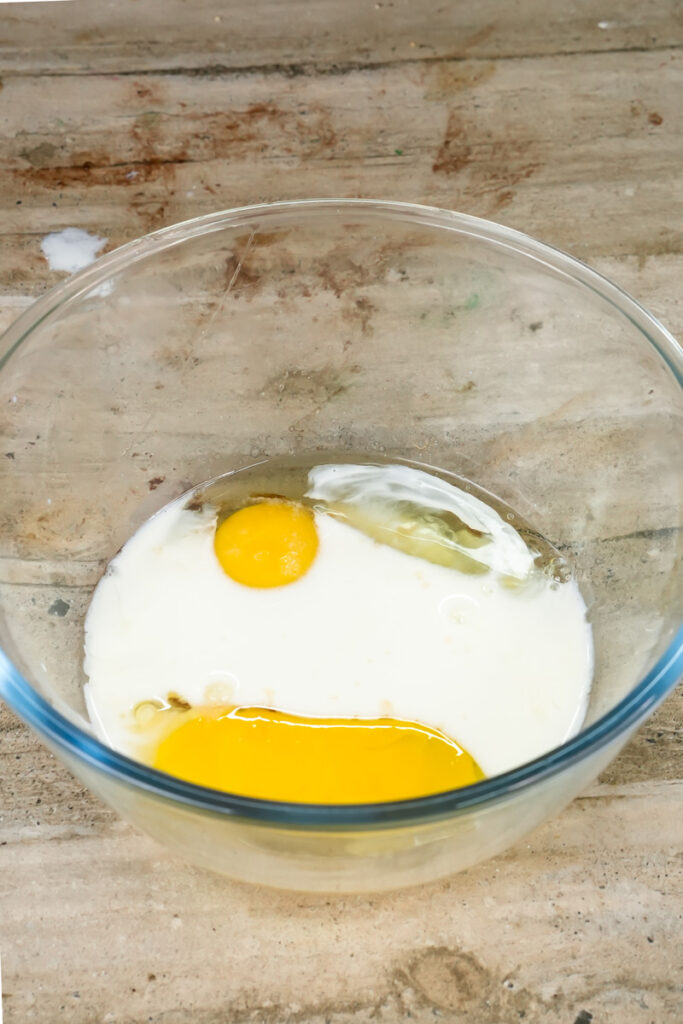 Adding sugar to eggs for pistachio muffin batter