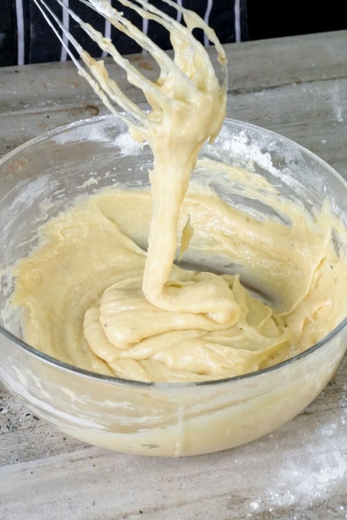 Smooth banana muffin batter with perfect consistency