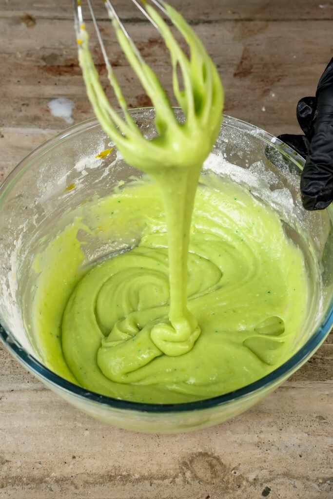 Smooth green pistachio muffin batter consistency