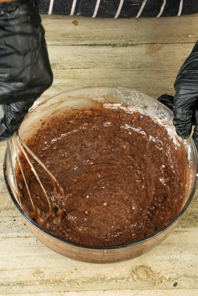 Whisking double chocolate muffin batter until smooth