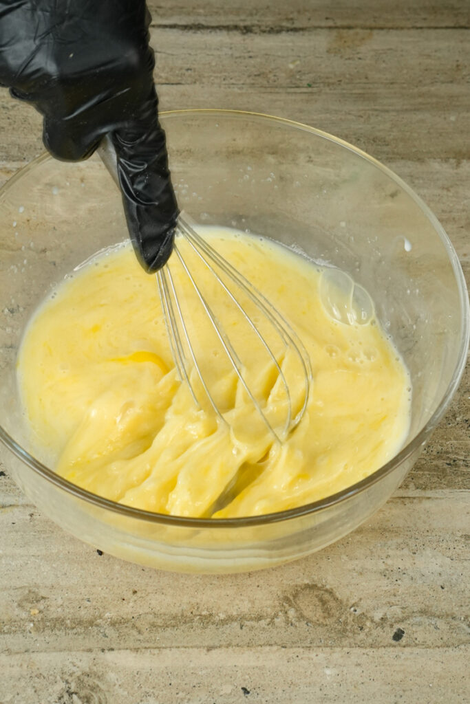 Whisking wet ingredients for double chocolate muffins