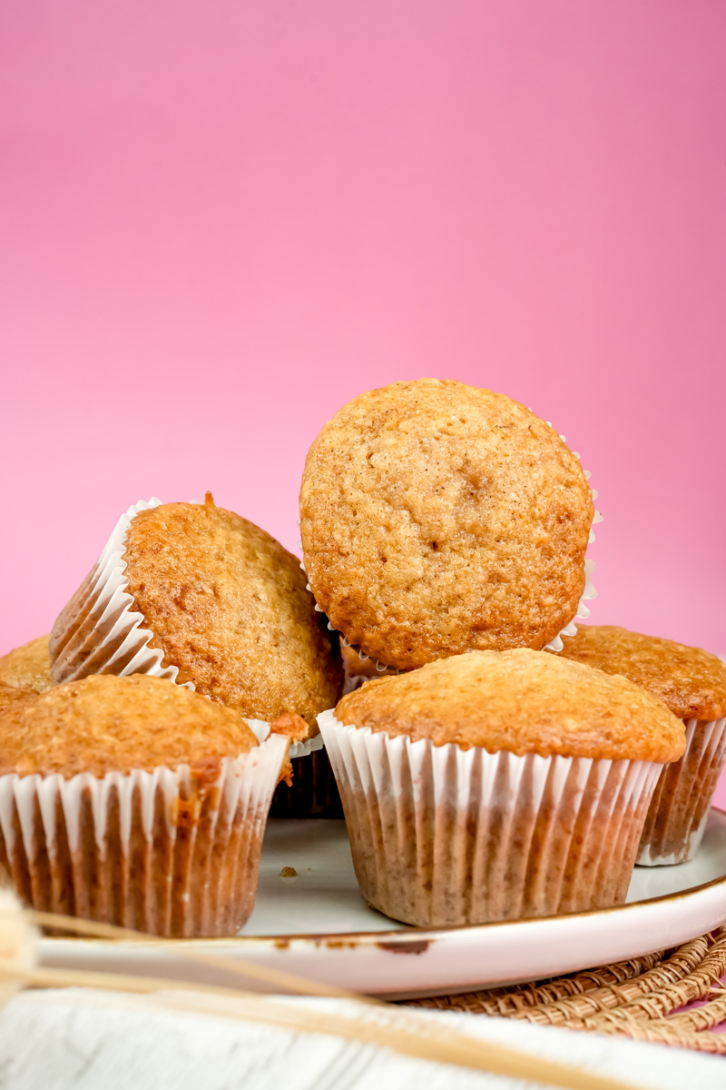 Close-up of applesauce muffins on white plate