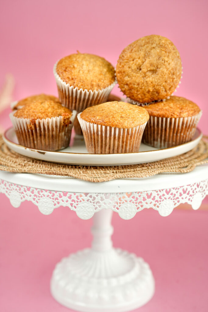 Close-up of applesauce muffins on white plate
