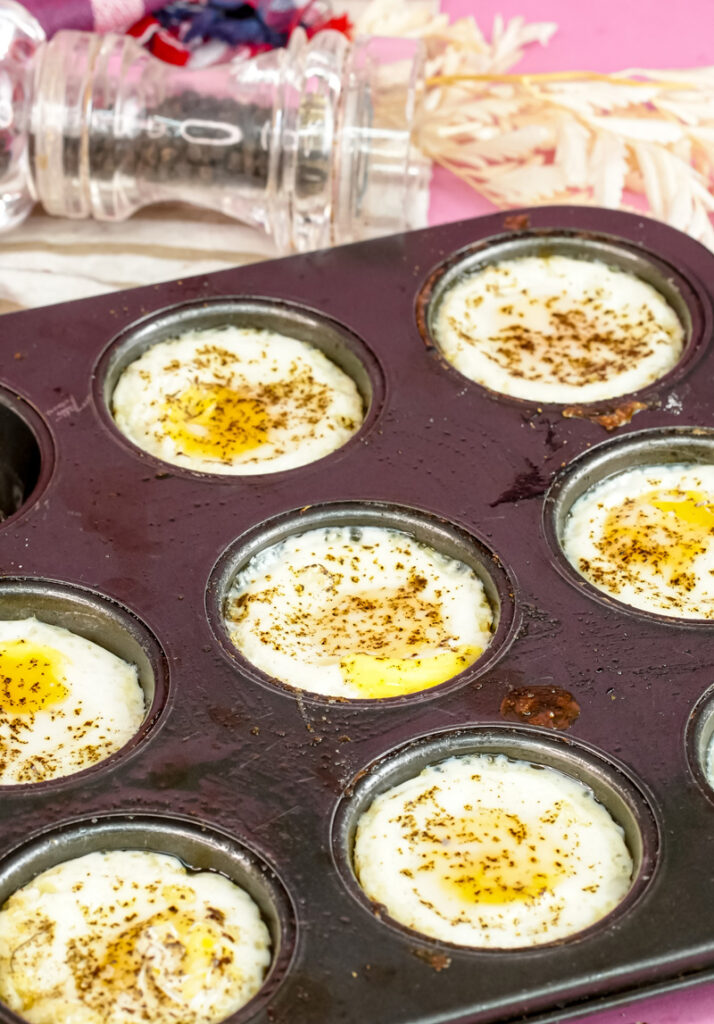 Finished muffin tin eggs with spice shaker
