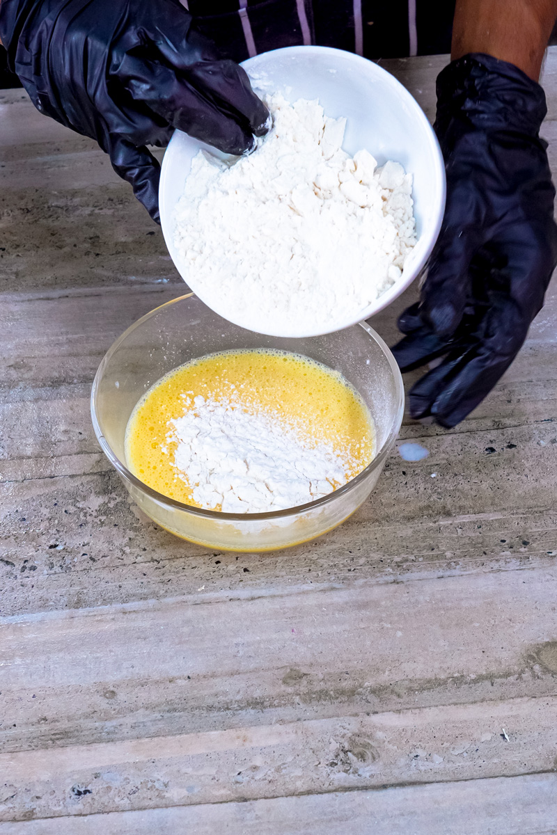 Adding flour to beaten eggs for Japanese pancake batter