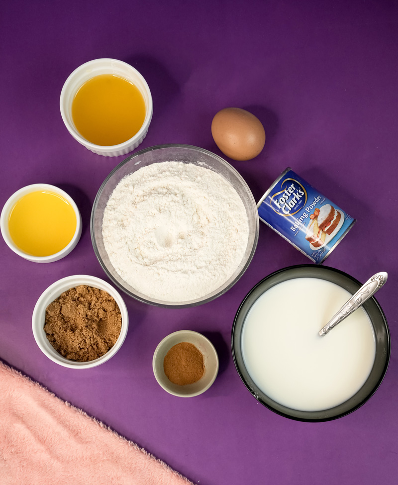 Cinnamon roll pancake ingredients - flour, eggs, milk, baking powder, brown sugar and cinnamon