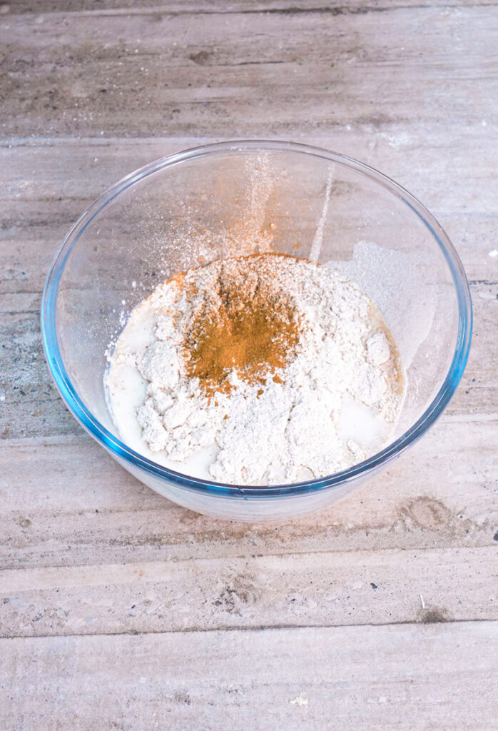 Dry ingredients for oat pancake batter in mixing bowl