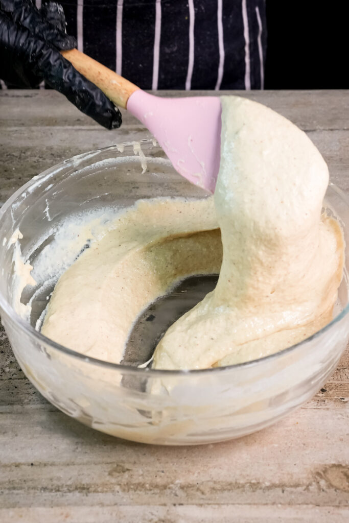 Folding pancake batter with rubber spatula