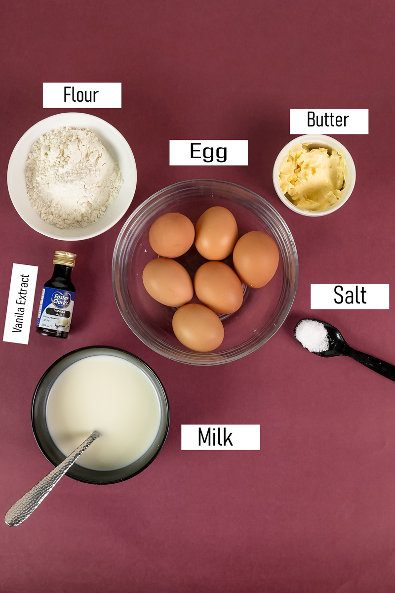 German pancake ingredients: flour, eggs, butter, vanilla, milk, and salt