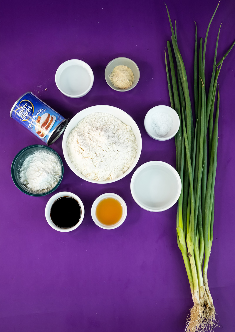 Korean scallion pancake ingredients laid out on purple surface