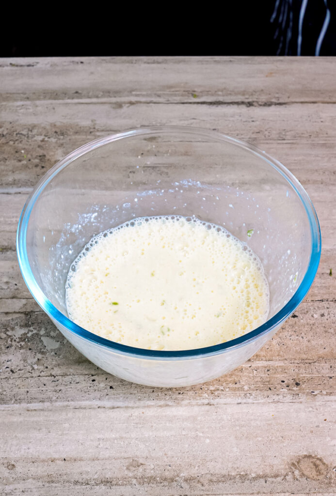 Mixed lemon ricotta pancake batter ready for cooking