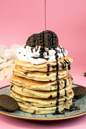 Final Oreo pancakes with generous chocolate syrup and crushed cookie topping