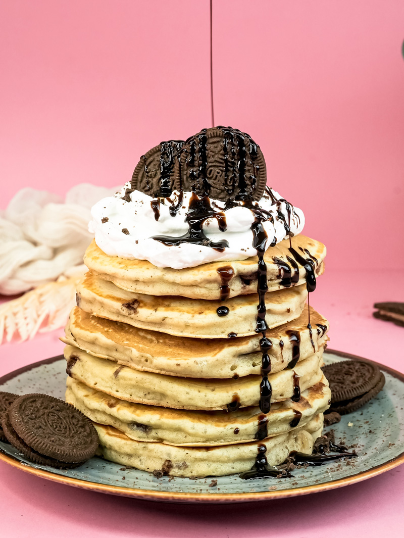 Final Oreo pancakes with generous chocolate syrup and crushed cookie topping