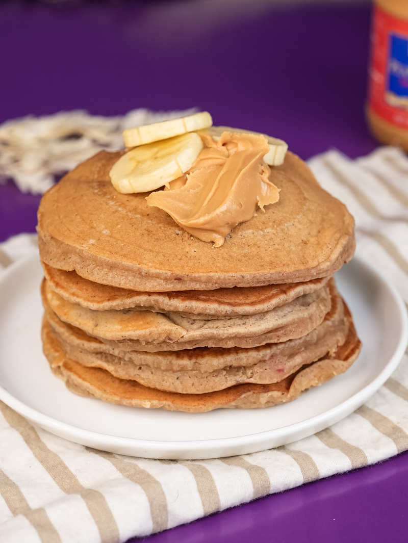 Perfect peanut butter pancakes recipe with banana and peanut butter toppings