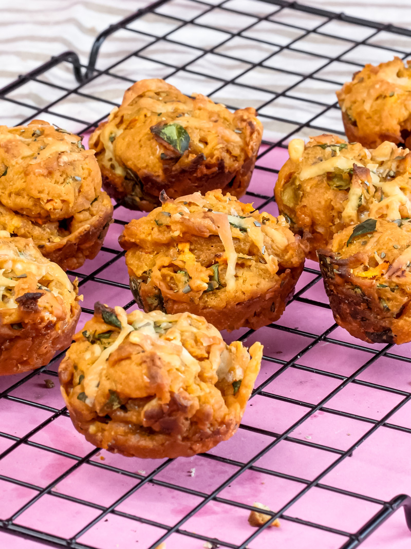 Pizza muffins cooling on wire rack after baking