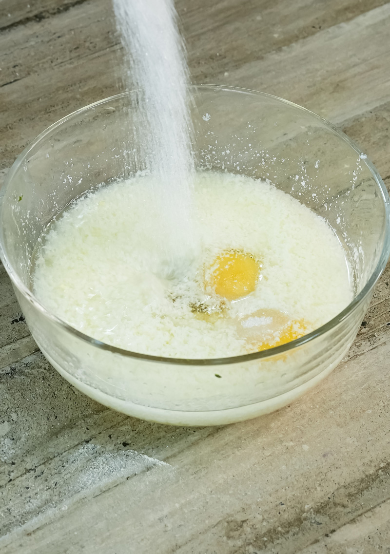 Pouring milk into wet ingredients for homemade Oreo pancakes