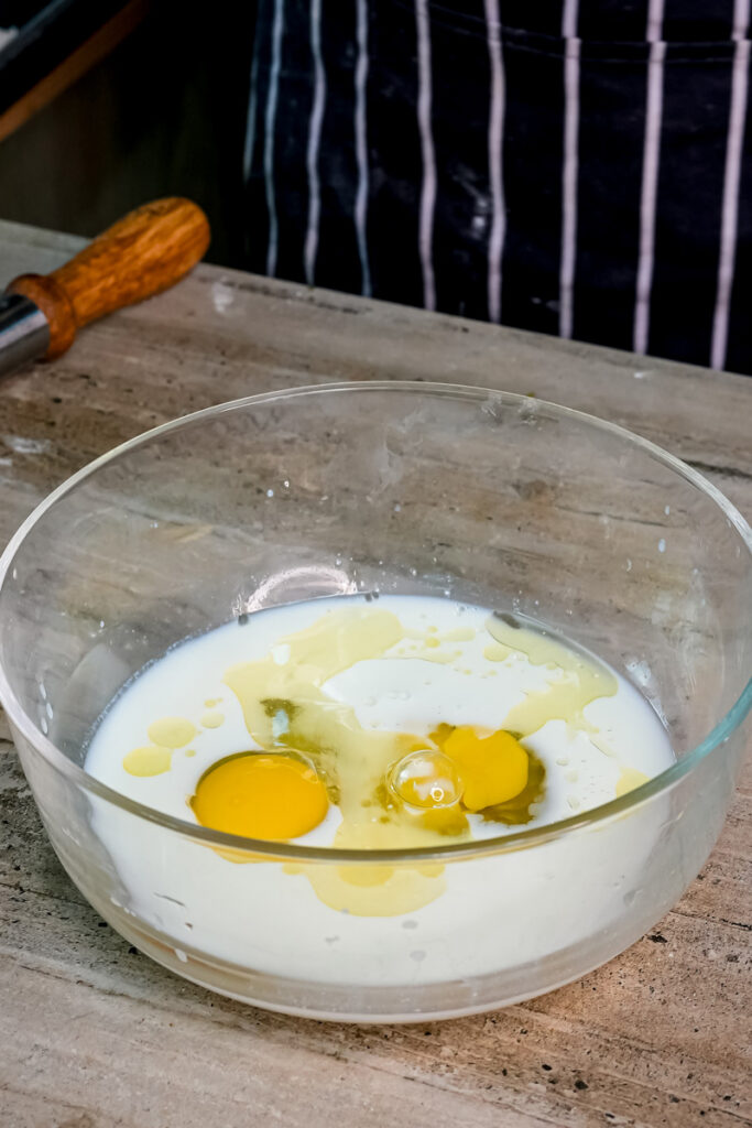 Whisked eggs and milk mixture for silver dollar pancake batter