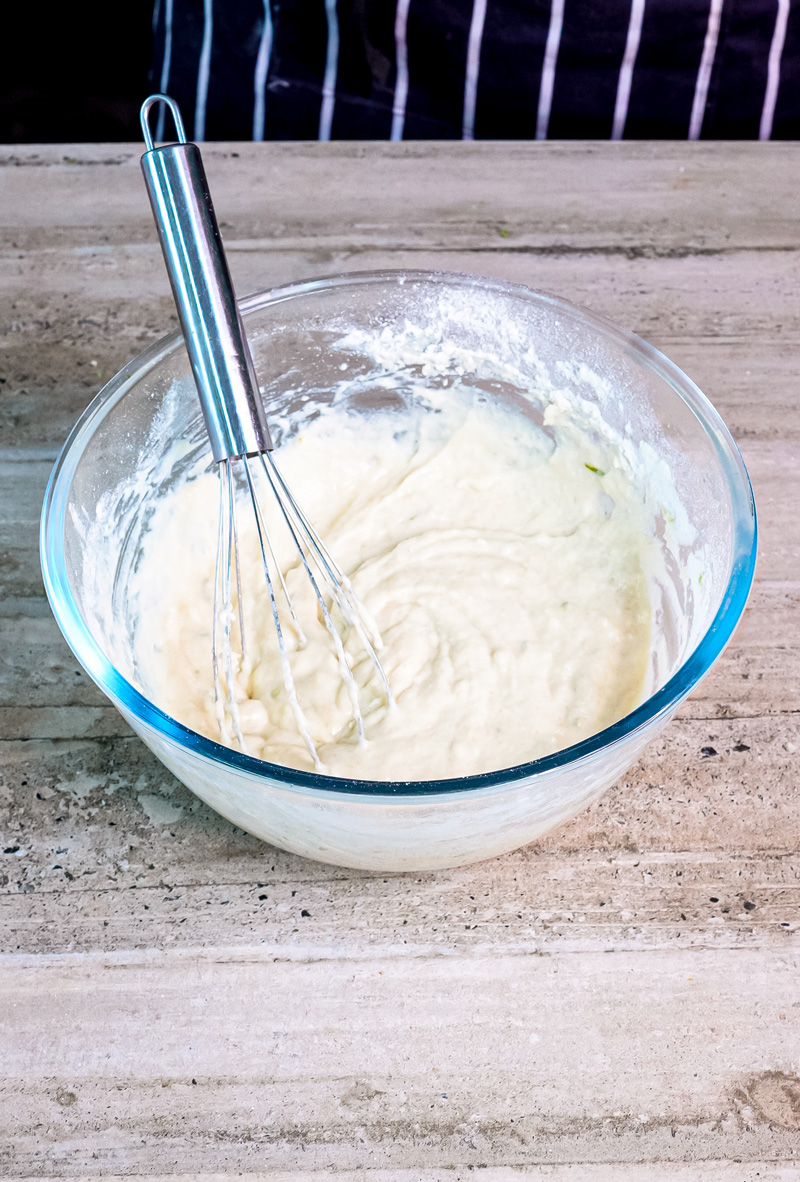 Whisking lemon ricotta pancake batter until smooth