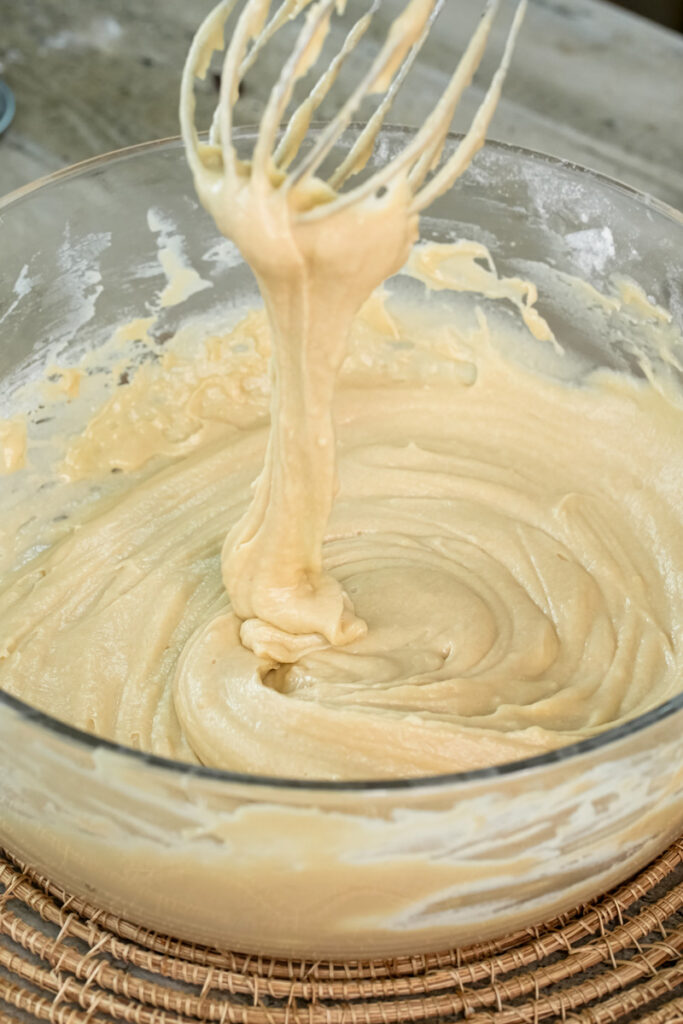 Whisking mini chocolate chip muffin batter until smooth