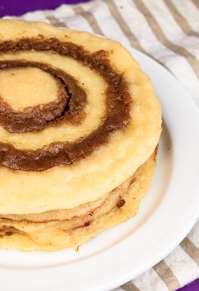 Close-up of cinnamon roll pancake spiral texture and layers