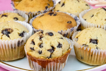 Freshly baked mini chocolate chip muffins with decorative ribbons