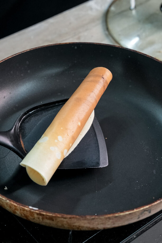 Finished pancake roll in pan ready to serve